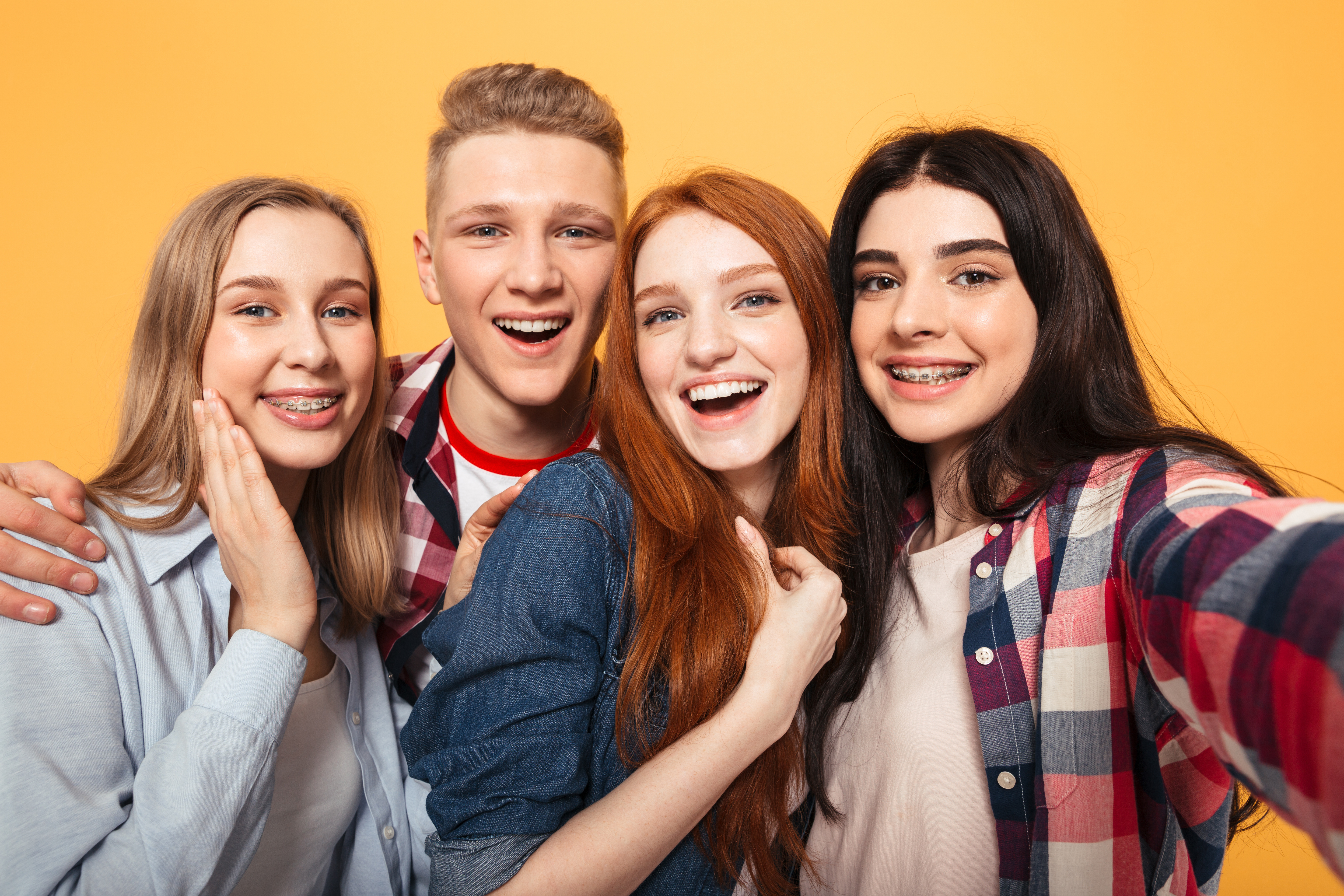 teens and young adults laughing
