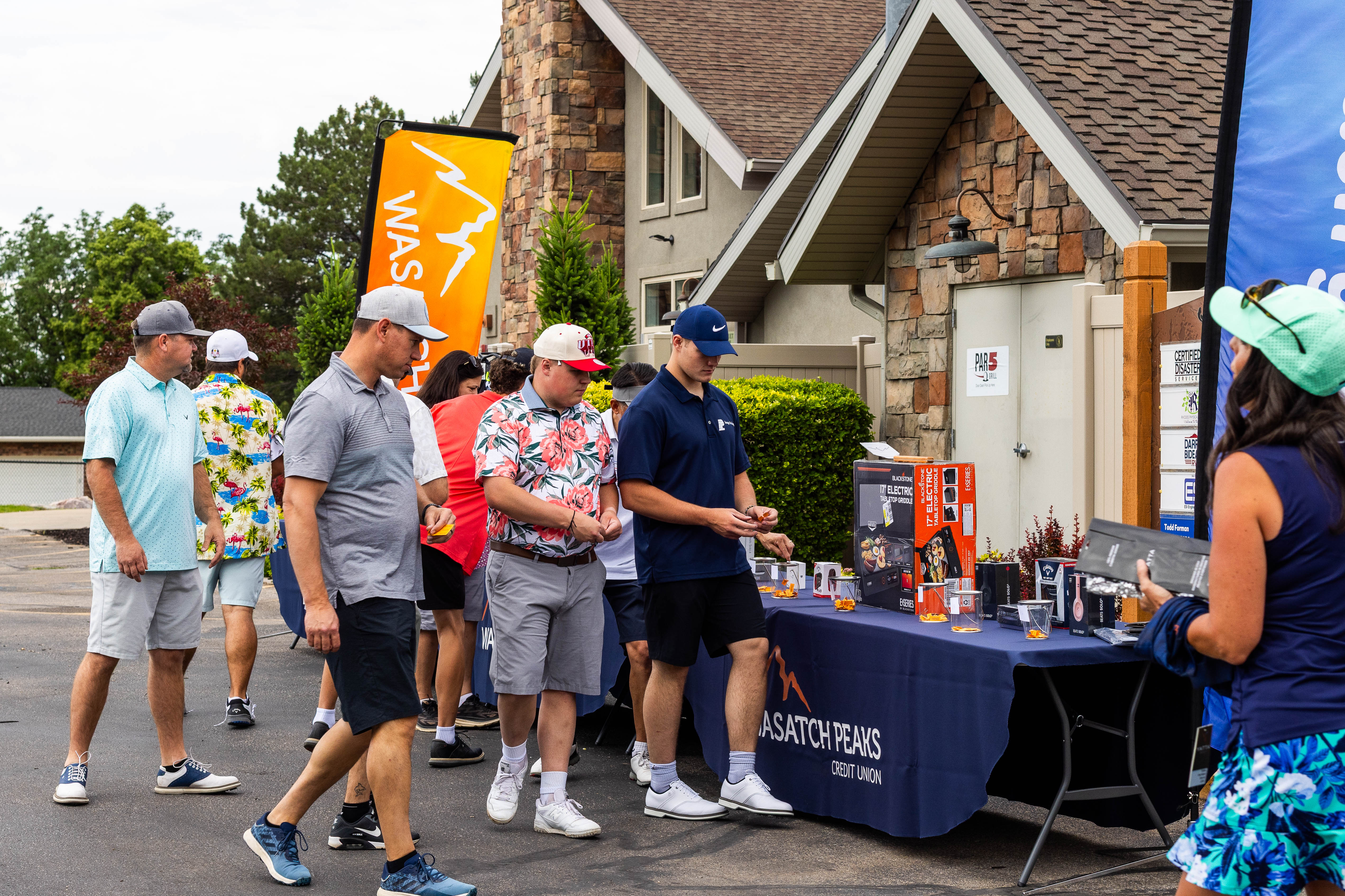 people looking at raffle items